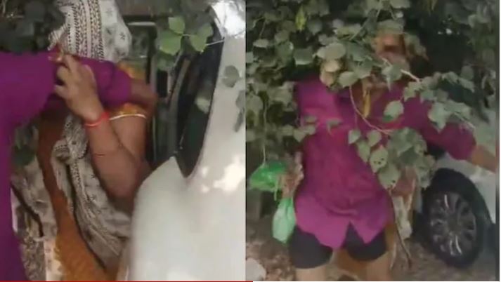 श्मशान के पास कार में महिला संग आपत्तिजनक स्थिति में